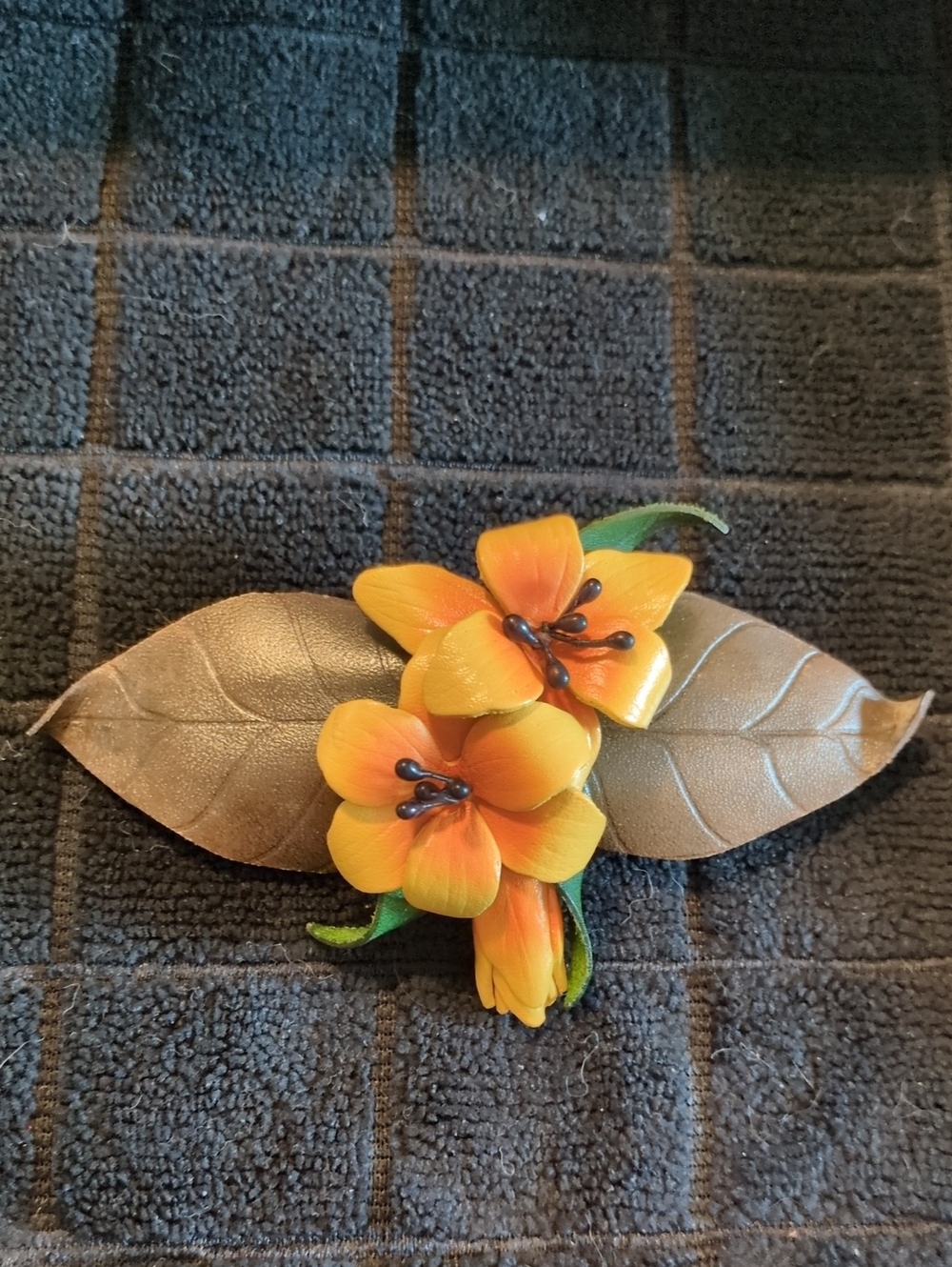 Orange Floral Leather Crafted with Leather Bronze Leaves